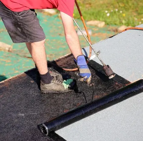 Roofing installation with torch