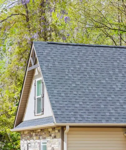 House with new shingle roofing